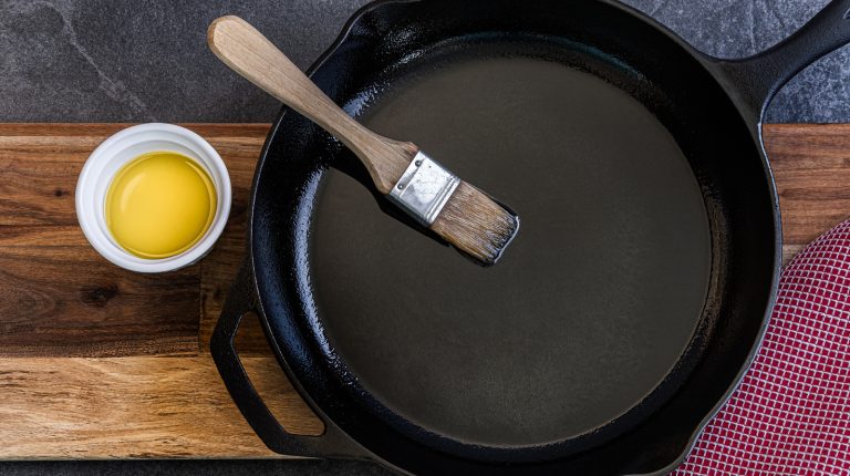 https://www.tastingtable.com/1590632/never-season-cast-iron-pan-smoker/