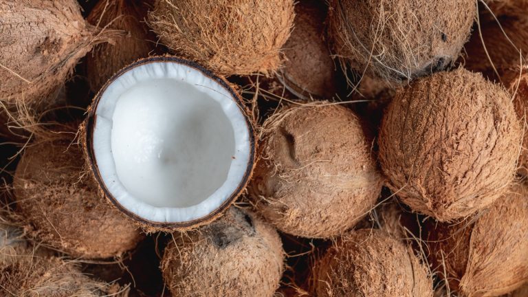 https://www.tastingtable.com/1589946/use-coconut-shells-smoker-summer/