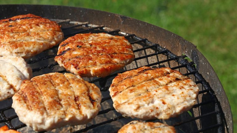 turkey burgers pictured on grill