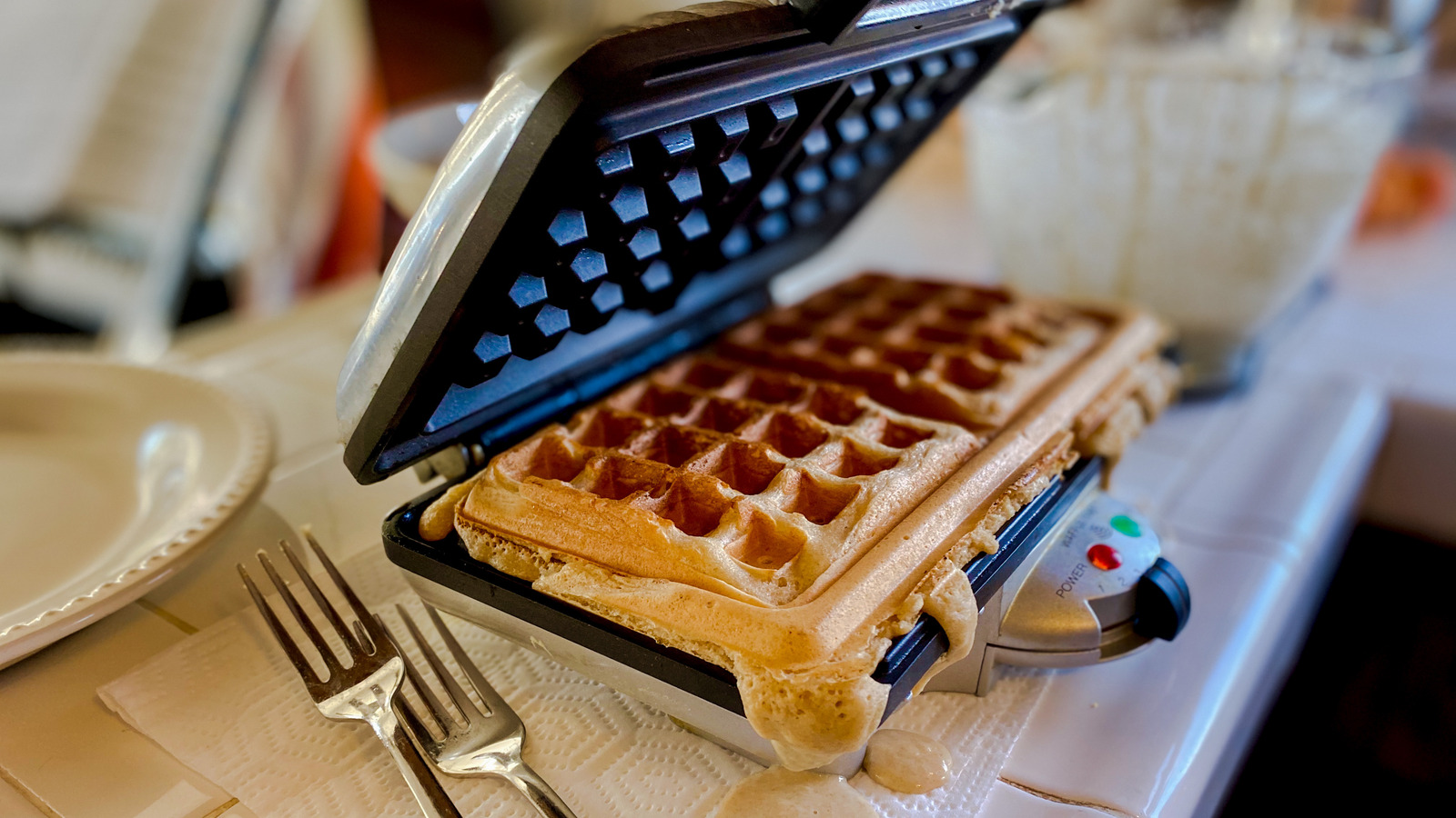 https://www.tastingtable.com/1376330/cooking-oil-clean-caked-bits-waffle-maker/