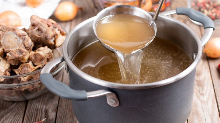 Bone broth in a saucepan