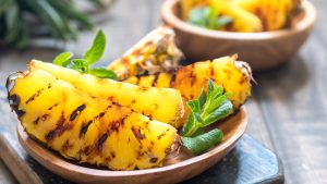 https://www.tastingtable.com/1596538/how-long-grill-whole-pineapple/