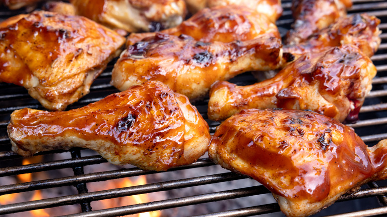 Chicken drumsticks on grill