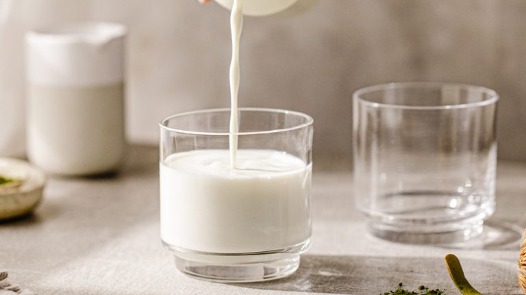 pouring milk into a glass