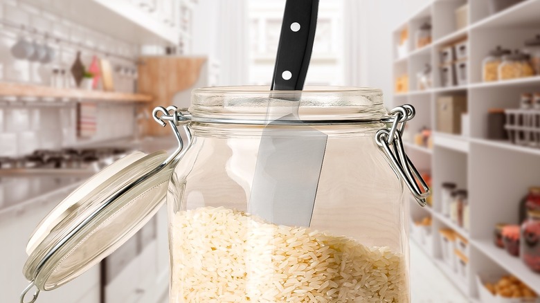 knife in bowl of rice