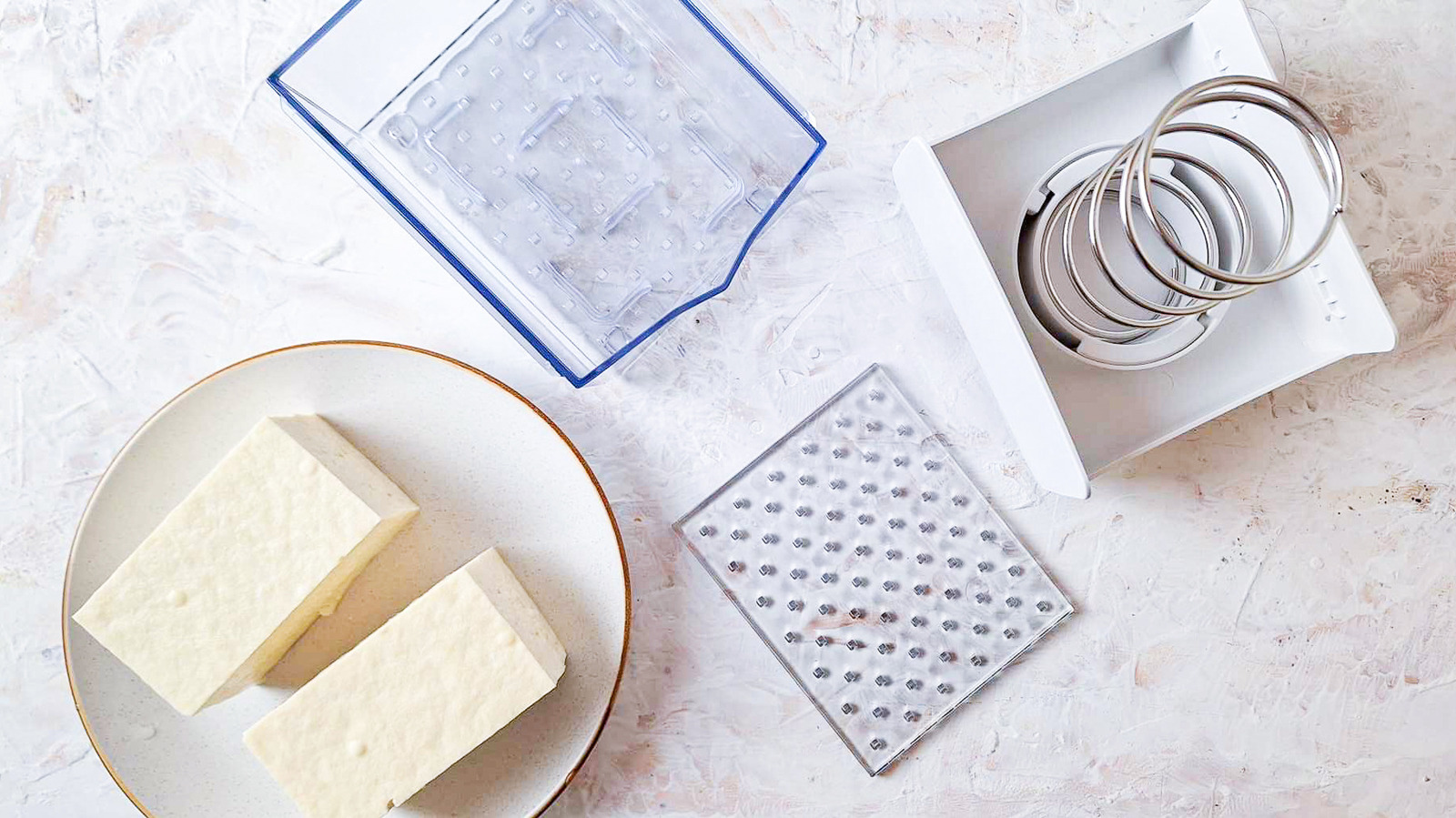 https://www.tastingtable.com/1585251/tofu-press-test-worth-it/