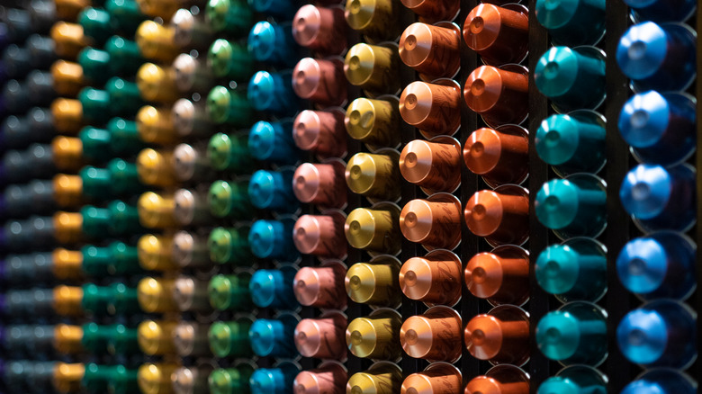 wall of nespresso capsules