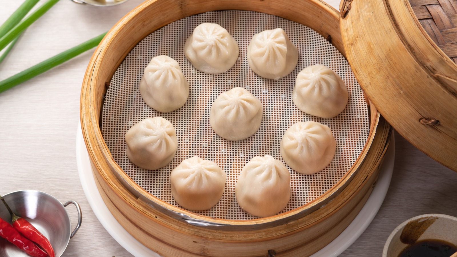 https://www.tastingtable.com/1379710/stop-eating-soup-dumplings-wrong/