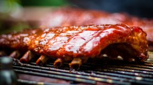 Triple dipped ribs on grill