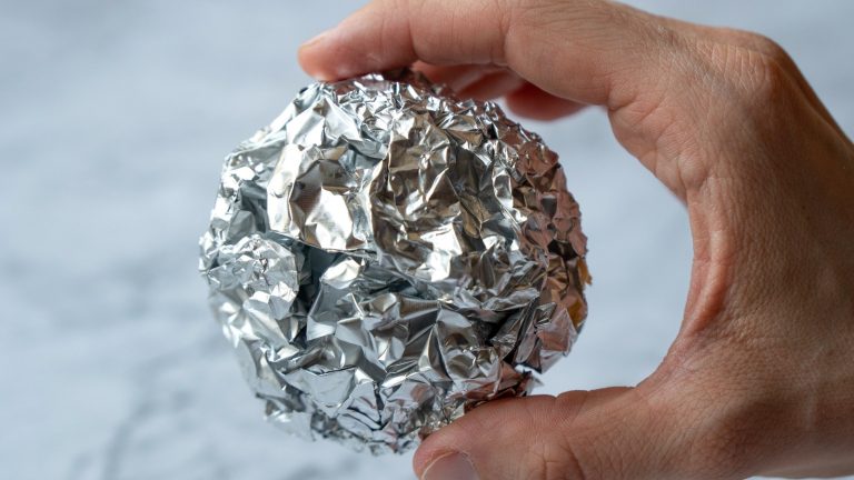 https://www.tastingtable.com/1506204/aluminum-foil-clean-inside-oven/